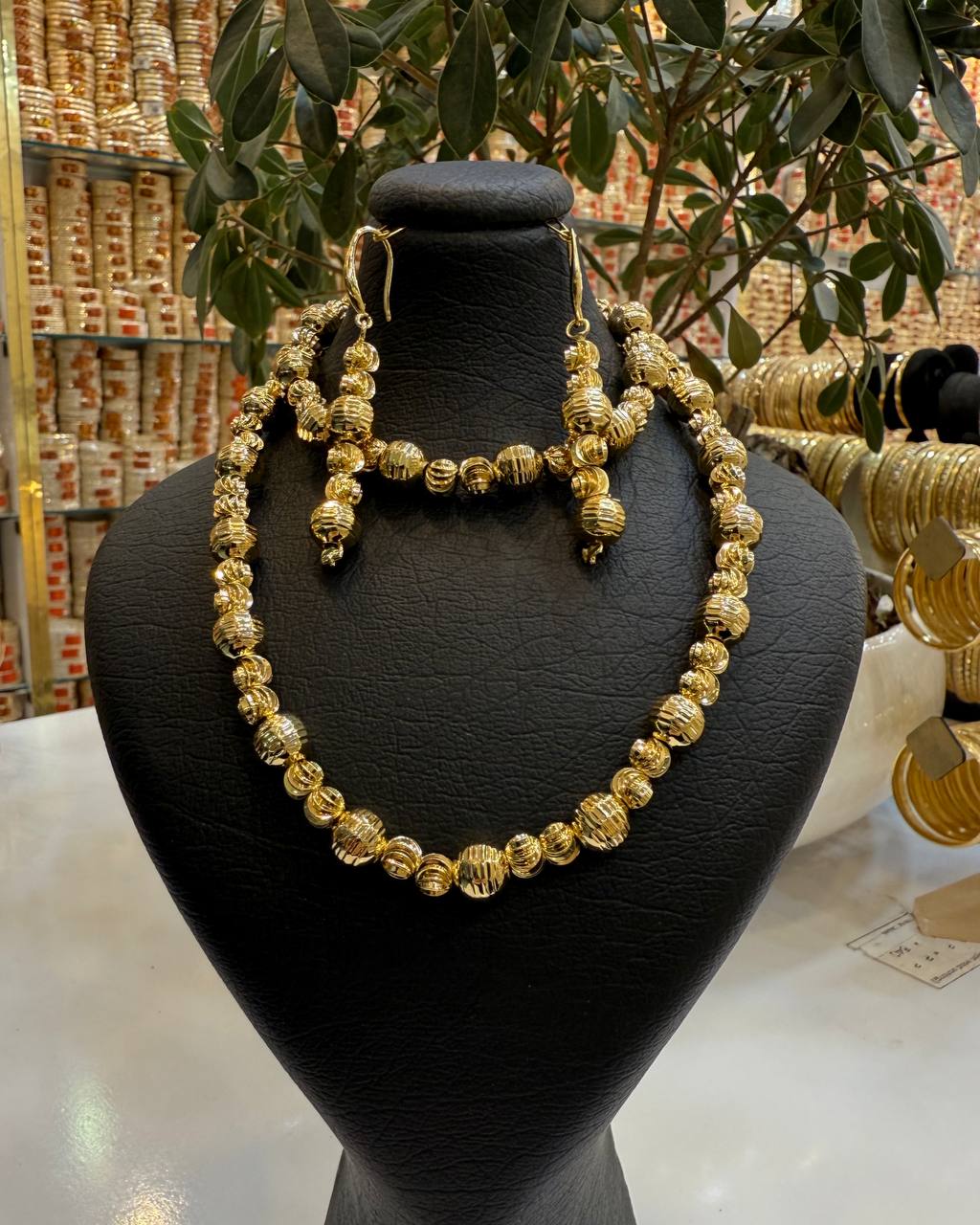 IMG_20250324_030324_355 نیم ست زنانه مدل تمام توپی رنگ طلایی - Image 1