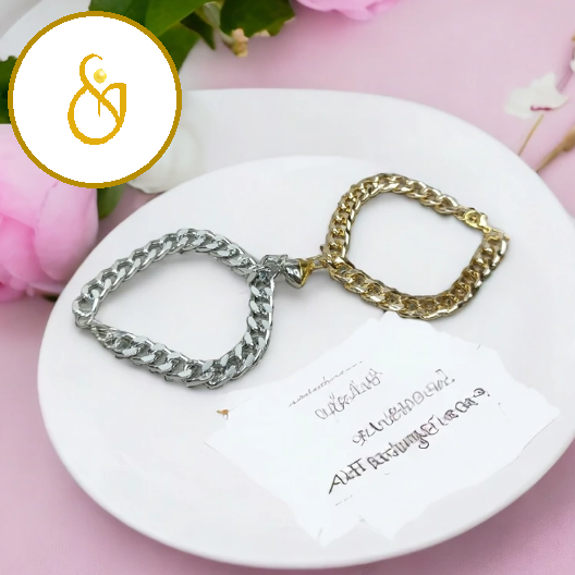 40165041064060 ست دستبند کارتیر مگنتی دوستی مدل قلب طلایی و نقره ای - Image 1